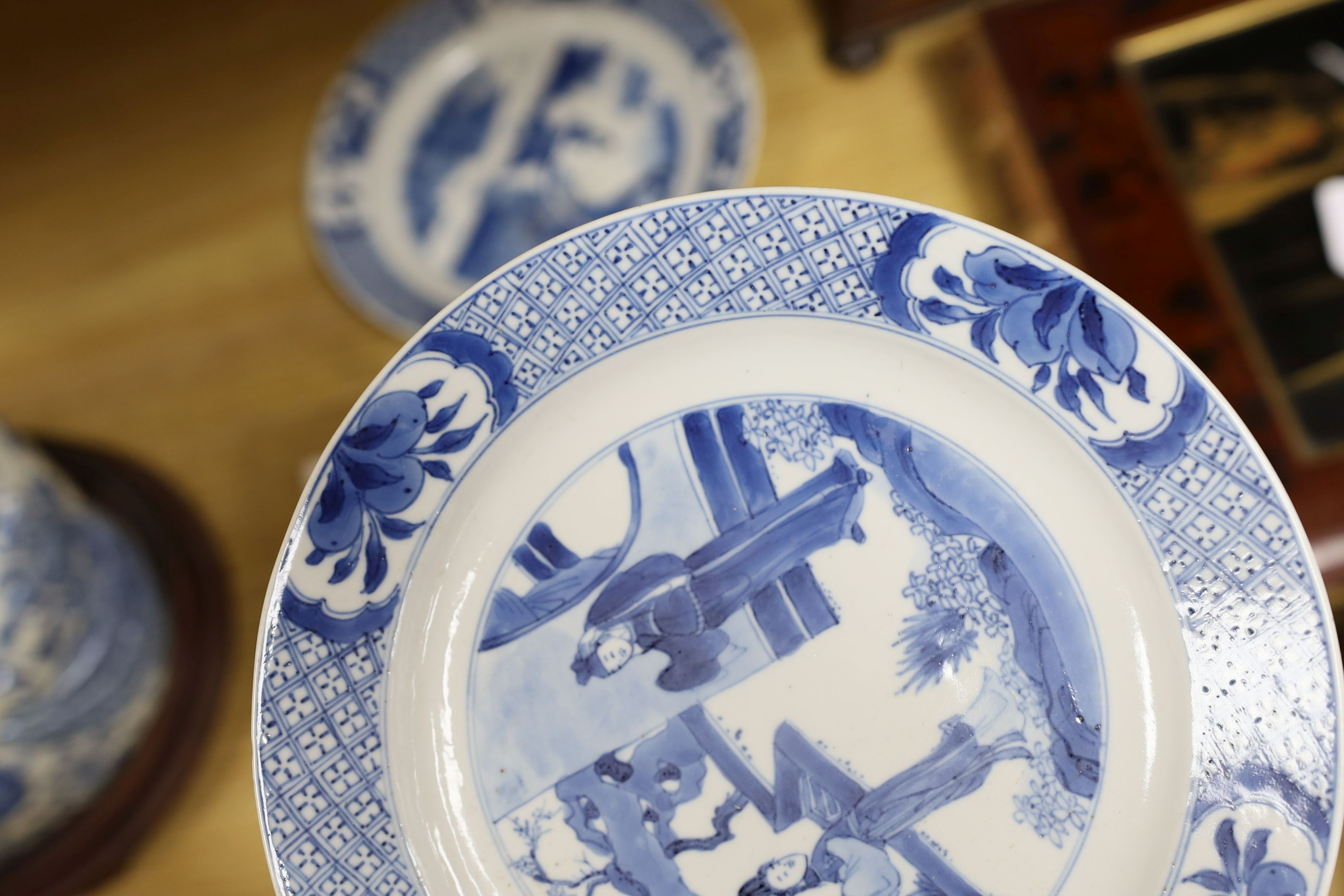 Two Chinese blue and white plates, Kangxi period, one with Kangxi mark the other a Chenghua mark, 21 cms diameter